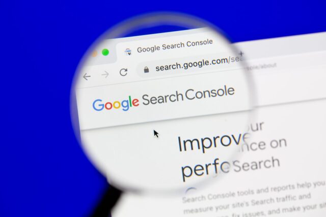 magnifying glass zooming on on 'Google Search Console' in the left hand corner of a computer screen