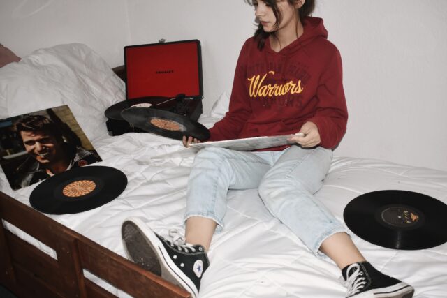 young woman with vinyl records