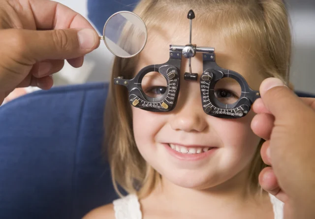 young girl getting her eyes tested
